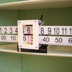 slide rule lego clock