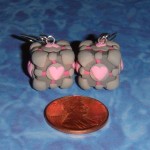 Portal Weighted Companion Cube Earrings