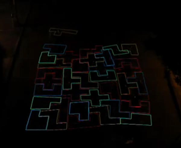 Skaters Create Human Tetris Game