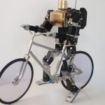 Primer-V2 Bike Riding Robot Balances Unaided On Two Wheel (video)