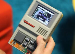 Carmen Sandiego handheld game system