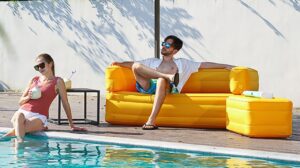 gentleman sitting on an Inflatable indoor and outdoor sofa
