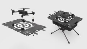 portable drone landing pad with integrated charger