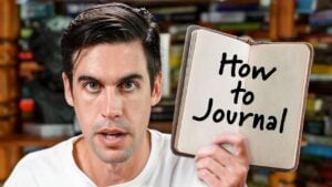 A notebook and pen symbolizing the practice of journaling for self-growth