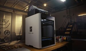 Close-up of the Bambu Lab H2S 3D printer showcasing its sleek design and features