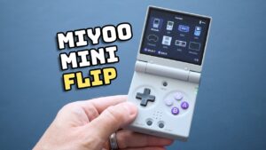[ALT 39] The Miyoo Mini Flip handheld gaming device with a clamshell design for portability
