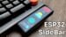 A sleek snap-on mini dashboard attached to a keyboard, displaying real-time data