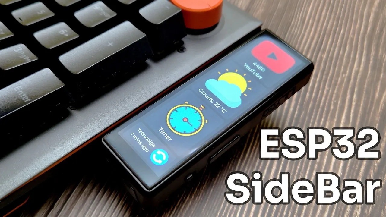 A sleek snap-on mini dashboard attached to a keyboard, displaying real-time data