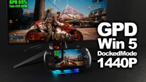 GPD Win 5 handheld running in docked mode at 65W, outputting 1440p to an external monitor