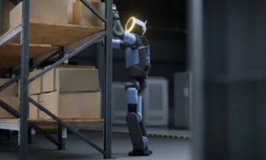 Atlas humanoid robot from Boston Dynamics shifts to real work at CES 2026, lifting up to 50 kg so teams can offload strain and cut injury risk