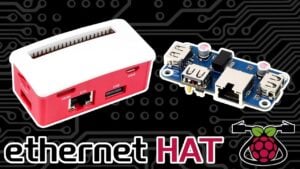 Compact hub attached to a Raspberry Pi Zero shows three USB ports and 10/100 Ethernet ready for wired projects.