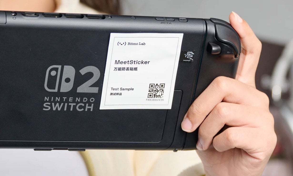 Prototype tracking units and setup card laid out for the February 9, 2026 global alpha testing group.