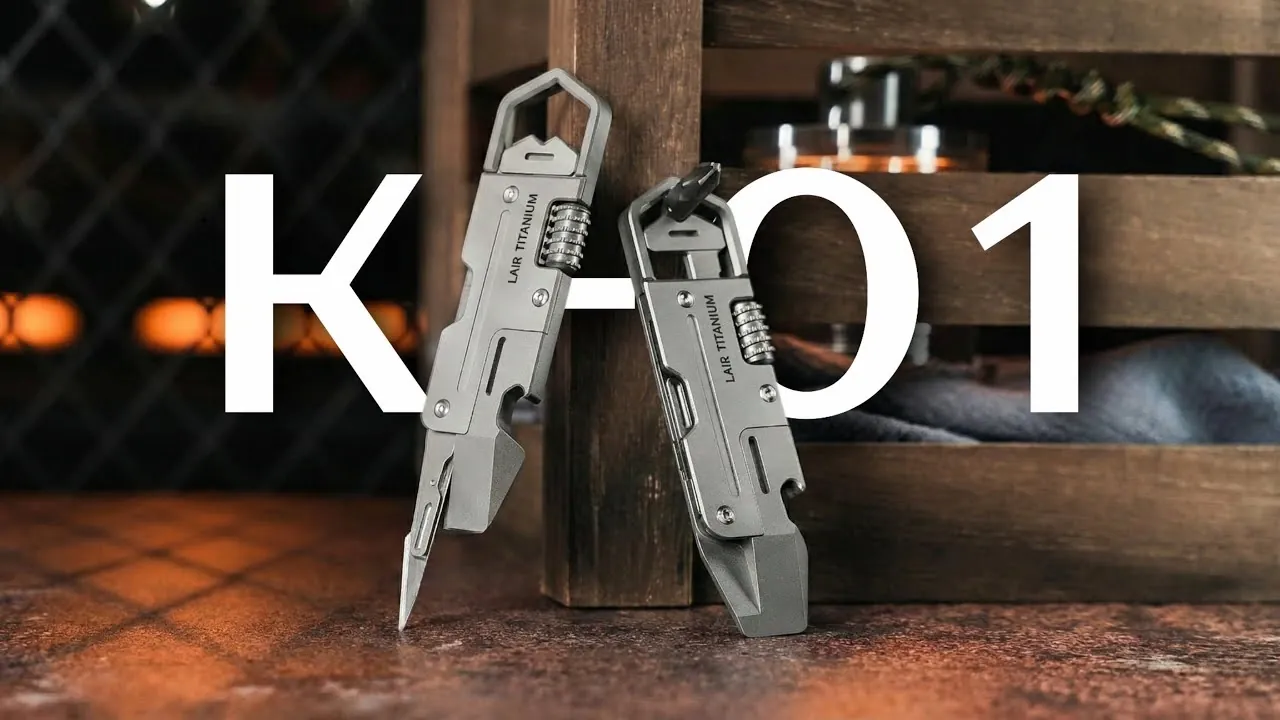 The Lair K-01 titanium pocket tool shown beside keys, highlighting its slim size and lightweight build.