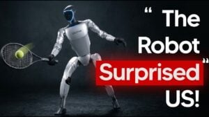 Unitree G1 humanoid robot holds a full-size tennis racket during a forehand test on an indoor court.