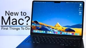 Display settings showing True Tone switched off and a scaled resolution option picked for more workspace.