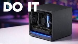 Valve Steam Deck placed next to a custom ARM-based handheld gaming console.