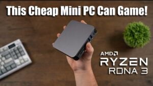 Size comparison of a tiny gaming mini PC next to a standard controller.