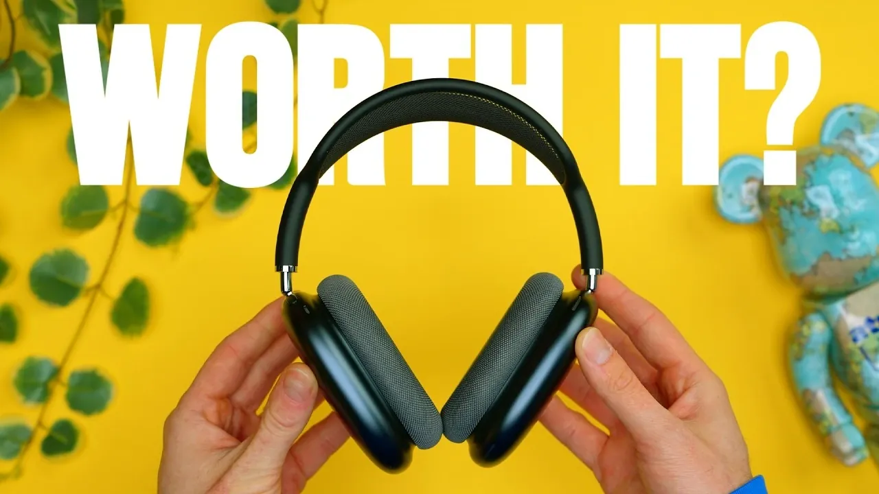 AirPods Max 2 worn on a train, illustrating noise canceling use during busy travel with background chatter.