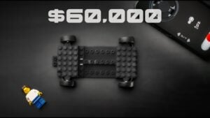 Creator David Elisson displaying his custom LEGO-compatible RC chassis