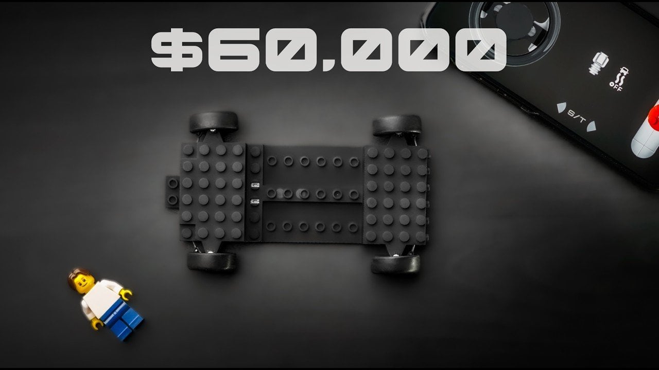 Creator David Elisson displaying his custom LEGO-compatible RC chassis