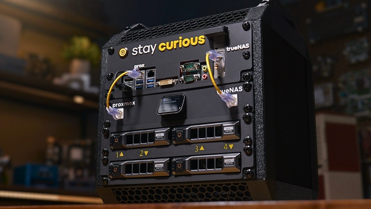 Compact 10-inch 3D-printed rack holding a mini-ITX backup server with front hot-swap drive bays.