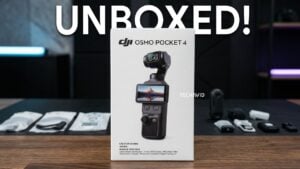 Close view of Osmo Pocket 4 accessories including Mic 3 transmitter, windscreen, clip magnet, and carry bags.