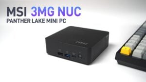 MSI Cubi NUC AI+ 3MG mini PC on a wooden desk next to a keyboard and mouse.