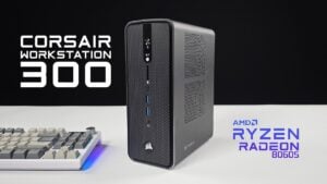 Corsair AI Workstation 300 mini PC sitting next to a monitor