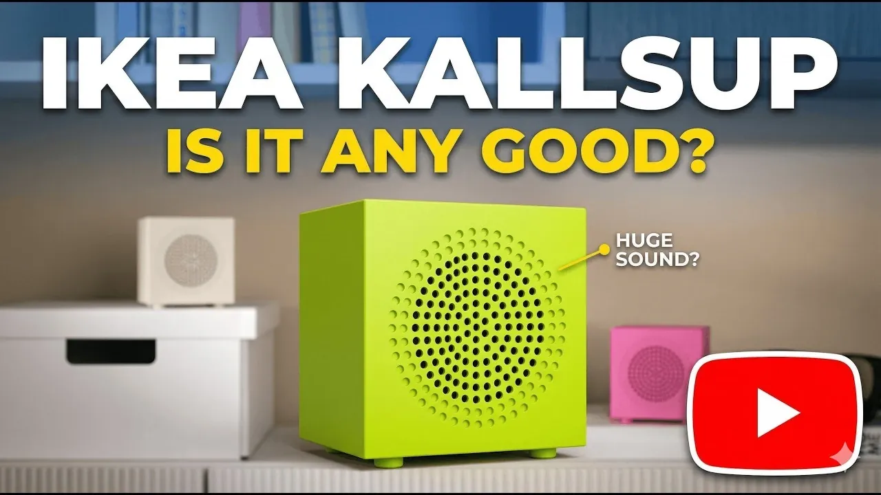 Hands holding the IKEA KALLSUP Bluetooth speaker during unboxing, showing the small size and minimalist design.