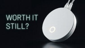 White IKEA Dirigera smart home hub on a wooden table