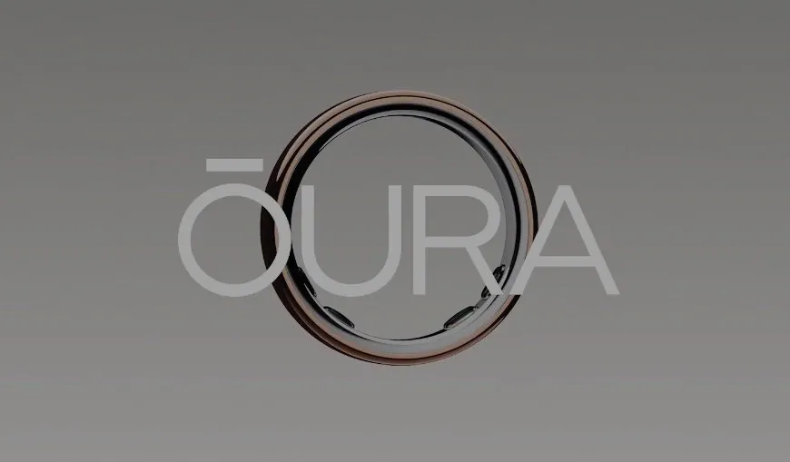 A disassembled Oura Ring 5 showing the sealed internal battery