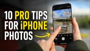 Person adjusting manual camera settings on an iPhone screen