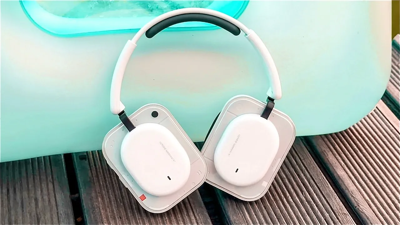 Person wearing the Nothing Headphone (a) demonstrating the snug fit