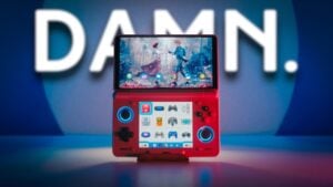 The AYN Thor handheld console sitting on a wooden desk.