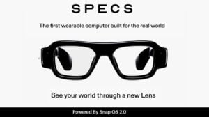 A person wearing the bulky new Snap Specs.