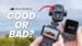 The DJI Pocket 4P handheld camera with its screen powered on.