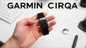 A person wearing the screen-free Garmin CIRQA wellness tracker on their wrist.