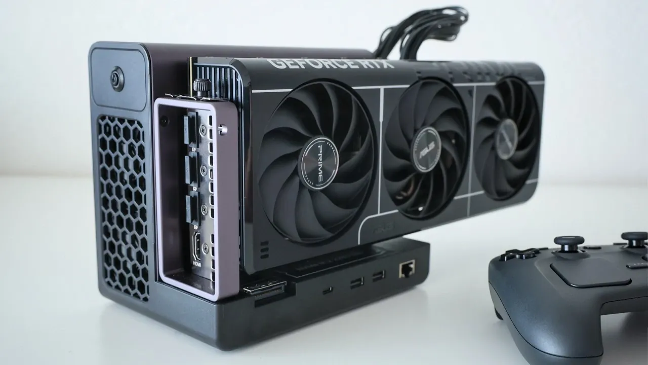 A handheld gaming device connected to the external GPU dock.