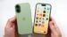 Two smartphones side by side comparing the iPhone 17 and iPhone 18 designs.