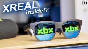 A person comfortably wearing the XBX A01 Plus video glasses.