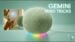 The new Google Home speaker placed on a living room table.