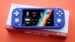 Front view of the Anbernic RG55G1 handheld gaming device
