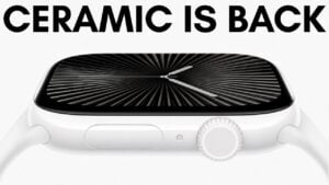 A glossy white ceramic Apple Watch worn on a wrist.