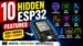 A close-up view of an ESP32 microcontroller chip on a green circuit board.