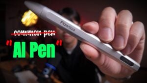 The Flowtica Scribe AI note-taking pen resting on a desk.
