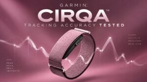 The Garmin CIRQA tracker worn on a user's biceps during a workout.
