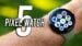 The Google Pixel Watch 5 displaying a customized Gemini watch face on the screen.
