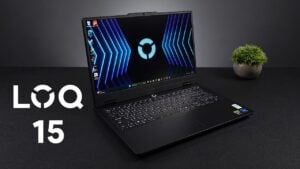 The Lenovo LOQ 15 gaming laptop opened on a desk to show the screen and keyboard.