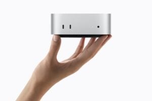 Front view of the new Mac mini desktop computer on a table