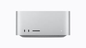 The new Apple Mac Studio desktop computer sitting on a desk.